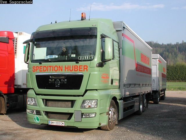 MAN TGX 26.440 Planenhängerzug Huber BM232CM